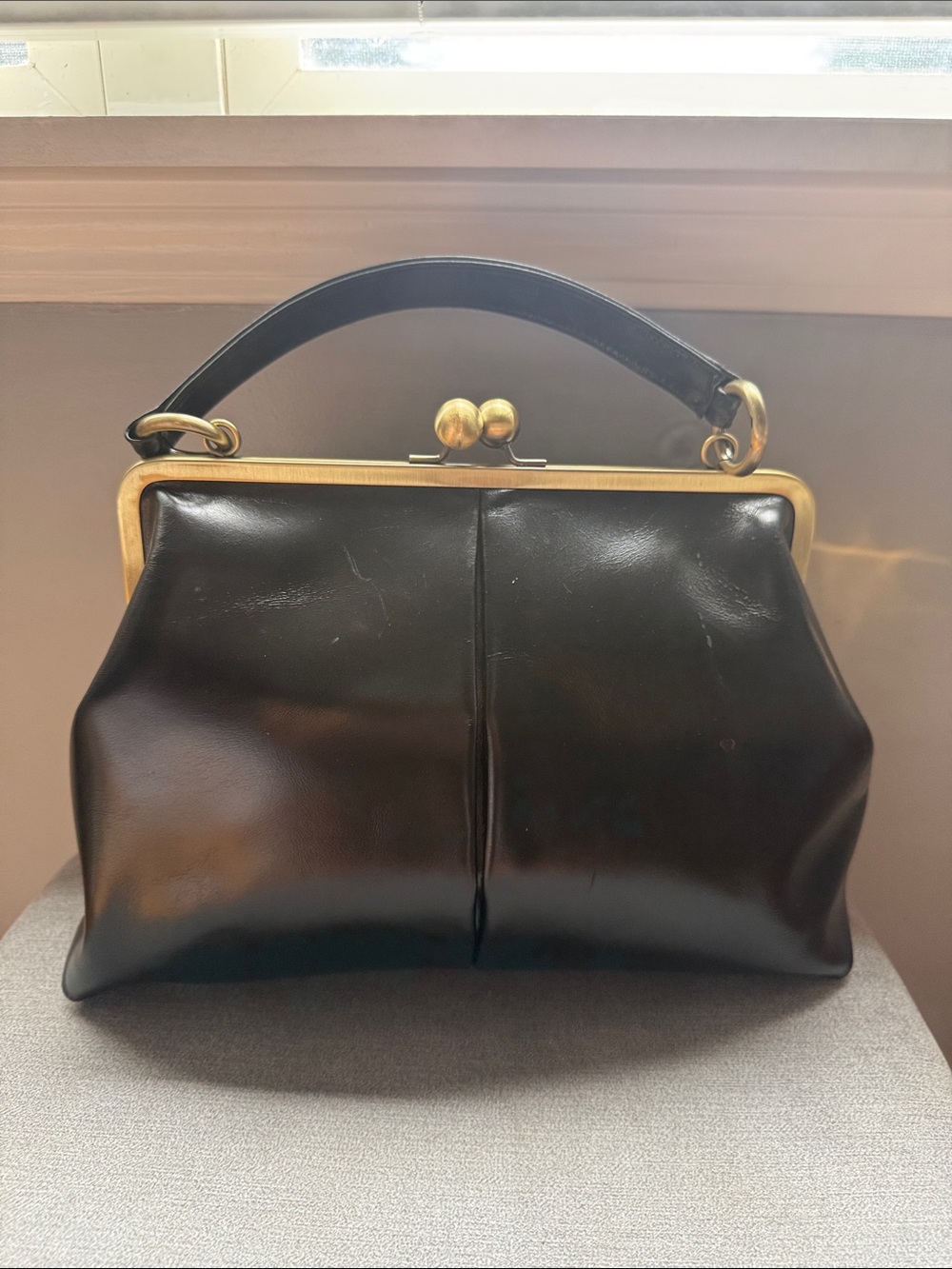 Vintage-Inspired Black Leather Frame-Top Clutch